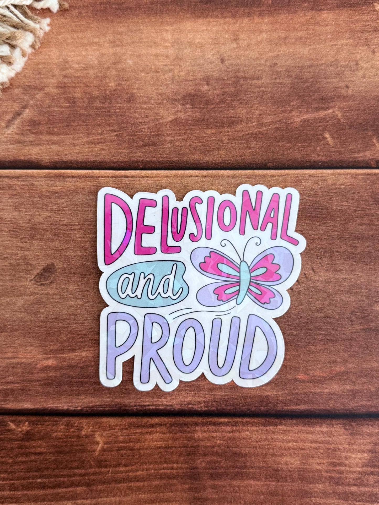 Delusional and Proud Holographic Sticker