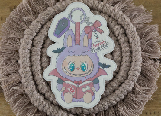 Trinket Doll Horror Book Club Holographic Sticker